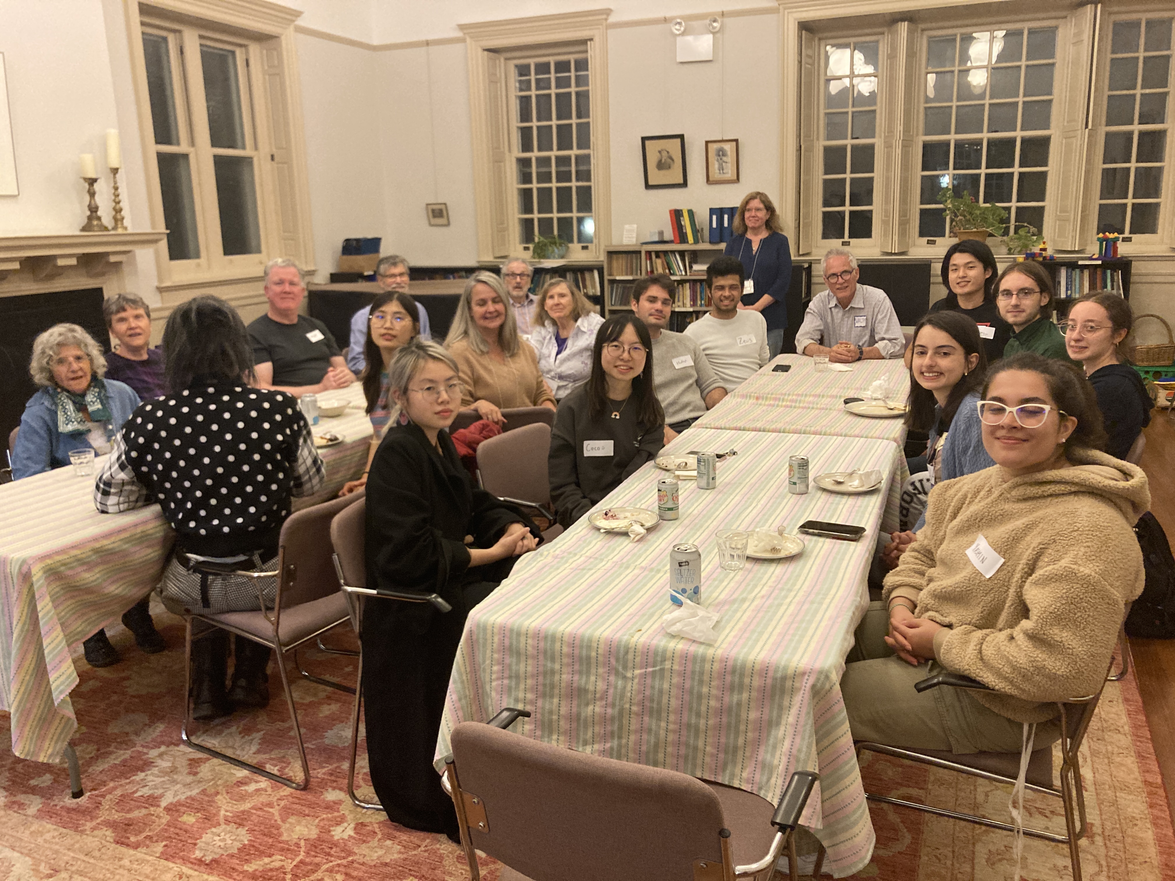 Photo of potluck dinner with Haverford College students and HMM members